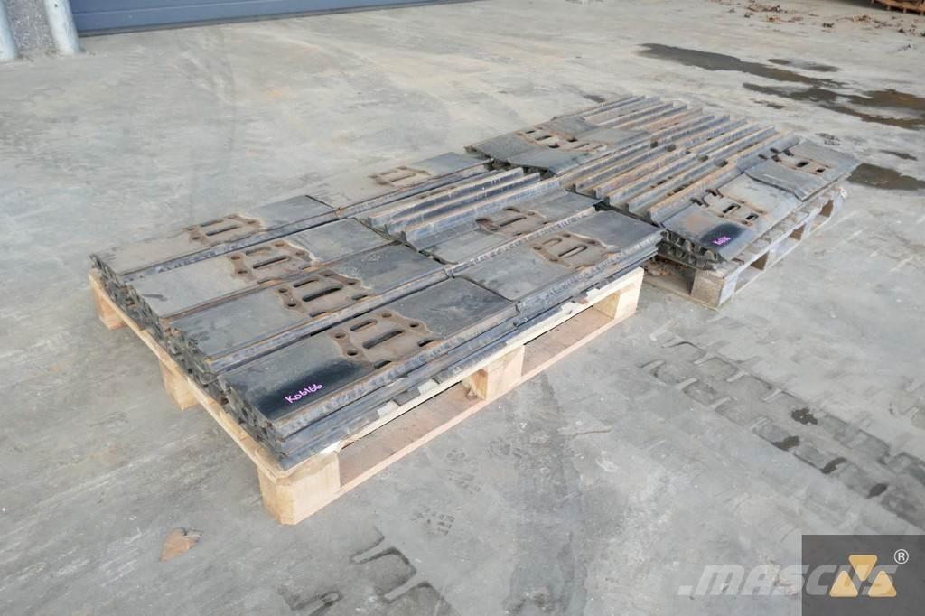 CAT 320 Trackshoes Gumiabroncsok, kerekek és felnik