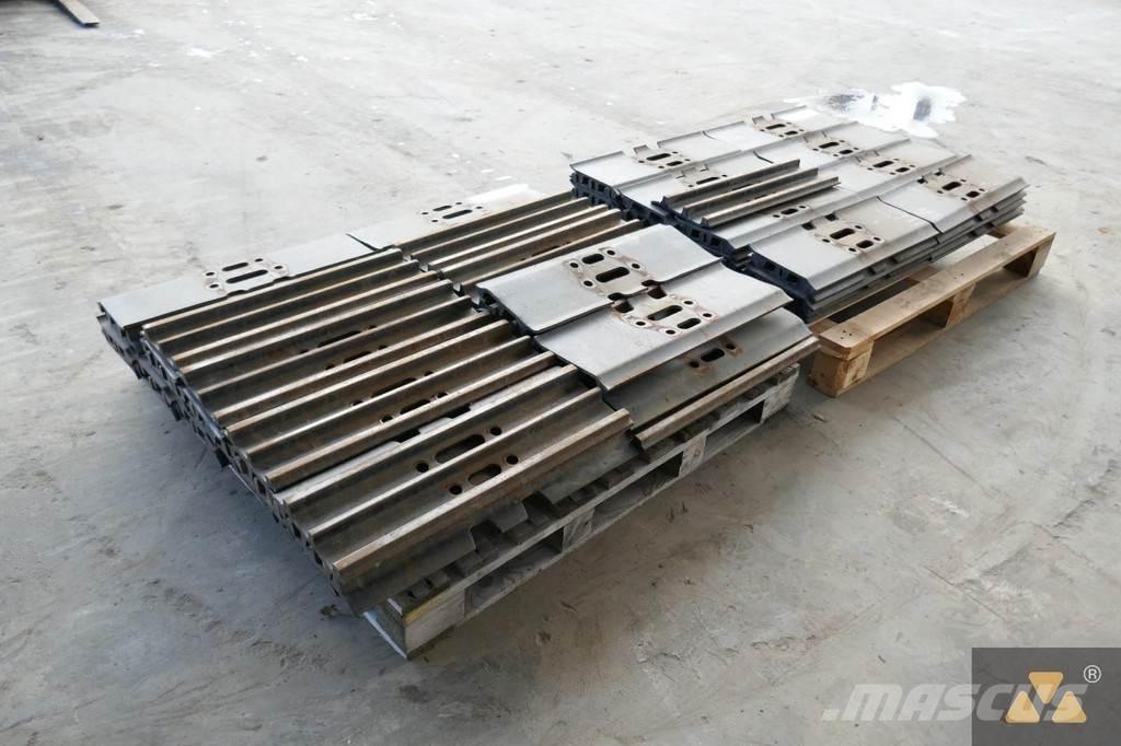 CAT 320 Trackshoes Gumiabroncsok, kerekek és felnik