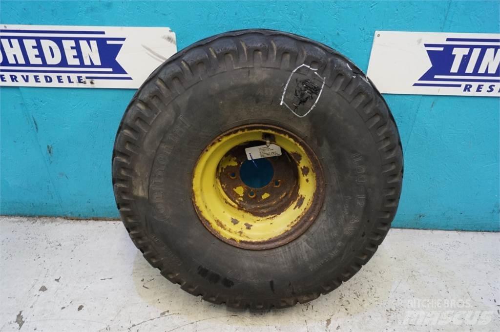 12 10.00-12 Gumiabroncsok, kerekek és felnik