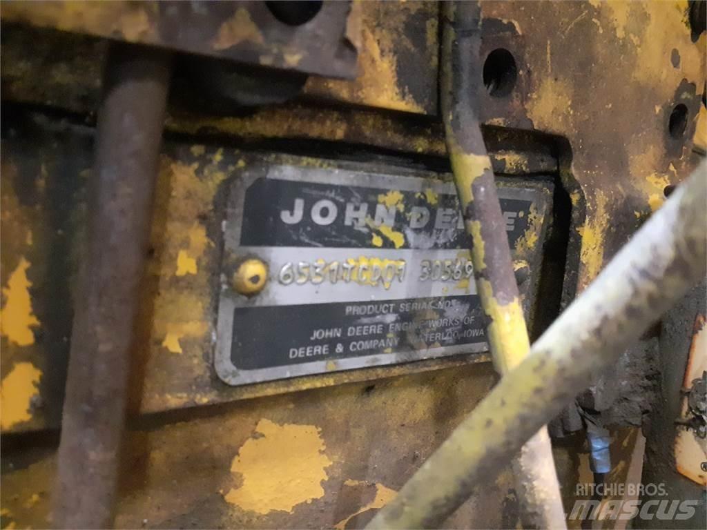 John Deere 644B Motorok