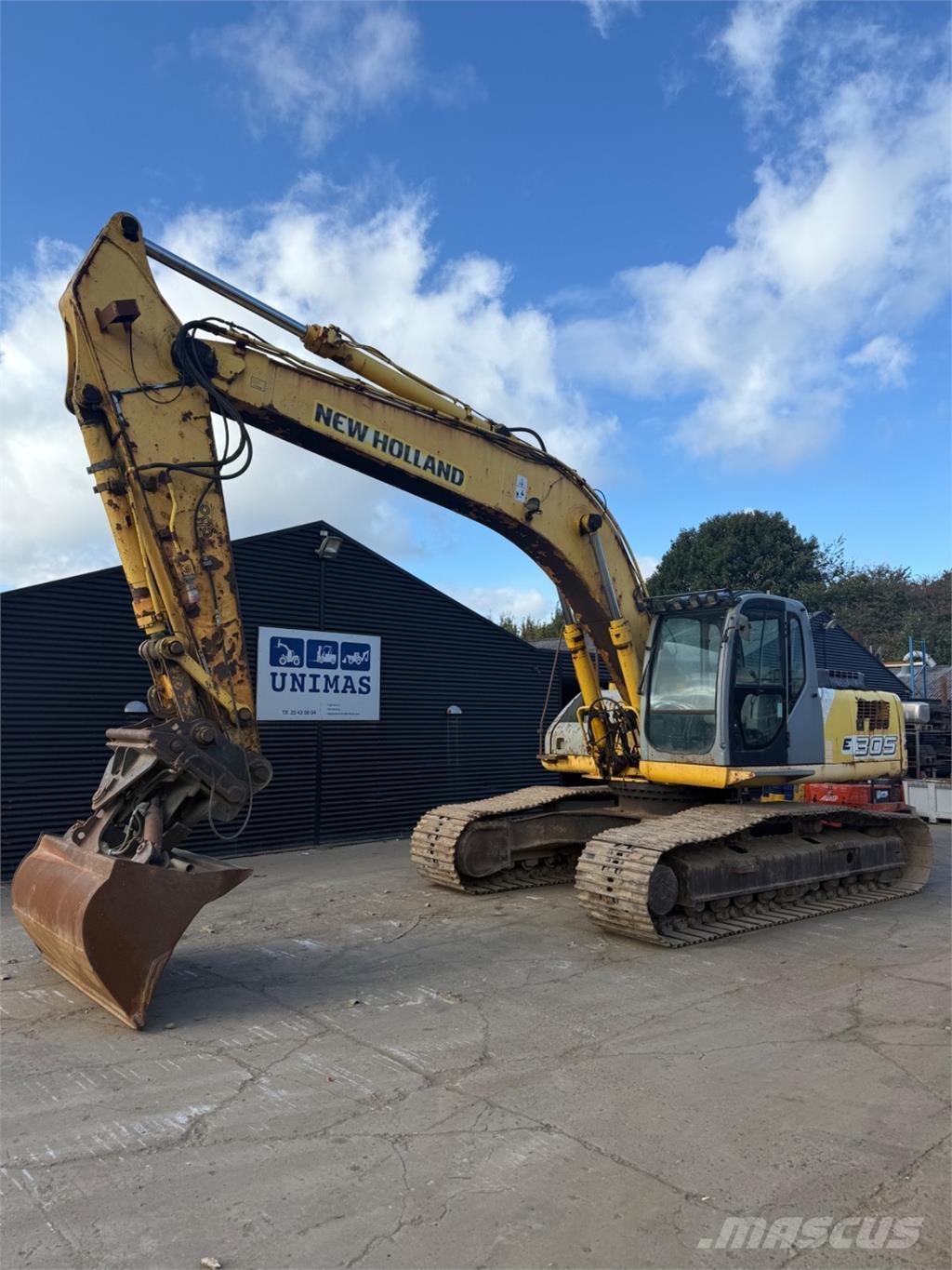 New Holland E305 Lánctalpas kotrók