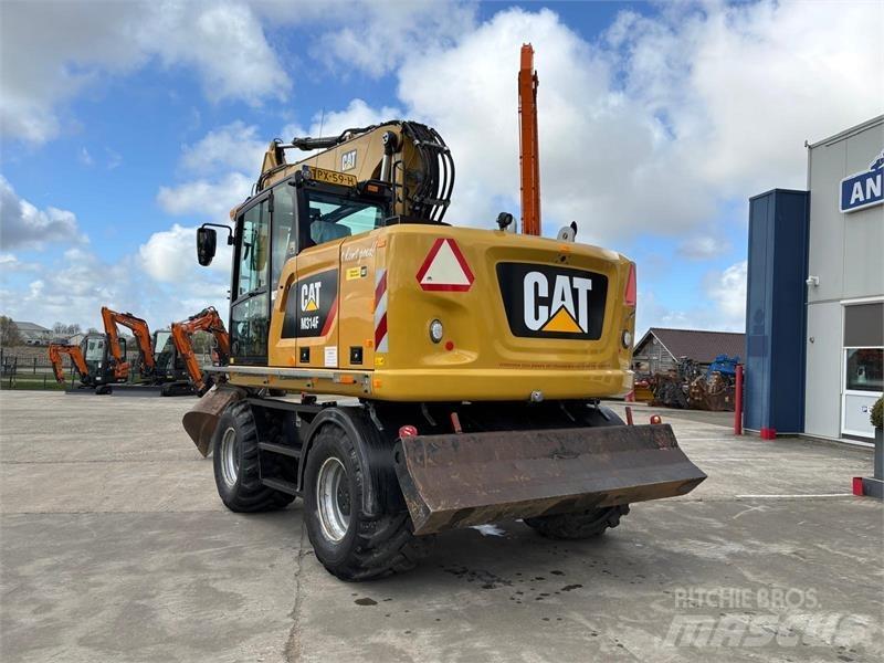 CAT M314F Gumikerekes kotrók