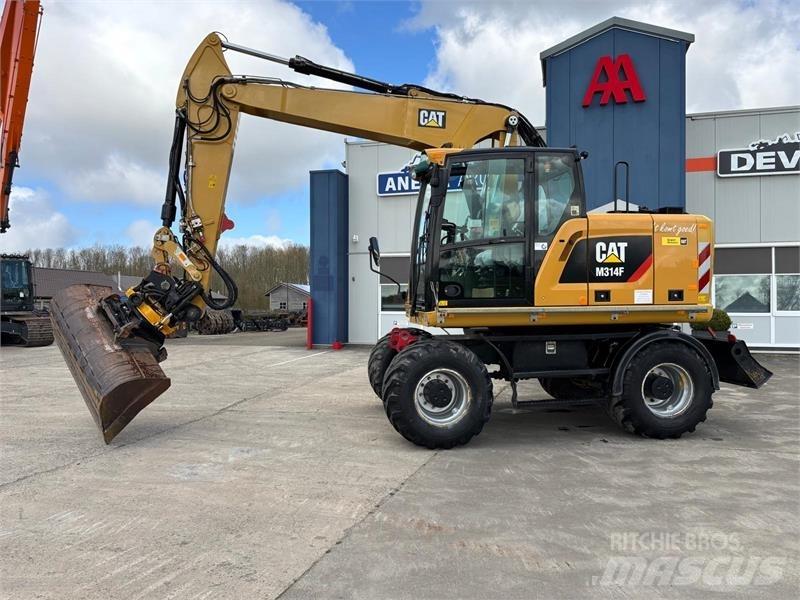 CAT M314F Gumikerekes kotrók