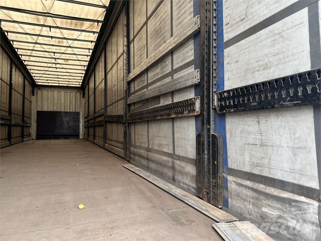 Krone  Elhúzható ponyvás félpótkocsik