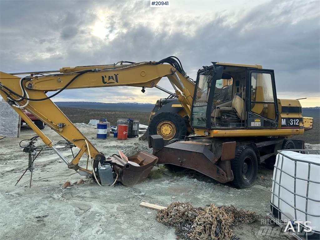 CAT 312 Gumikerekes kotrók