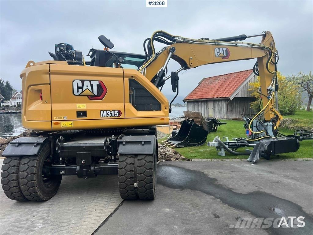 CAT M315 Gumikerekes kotrók