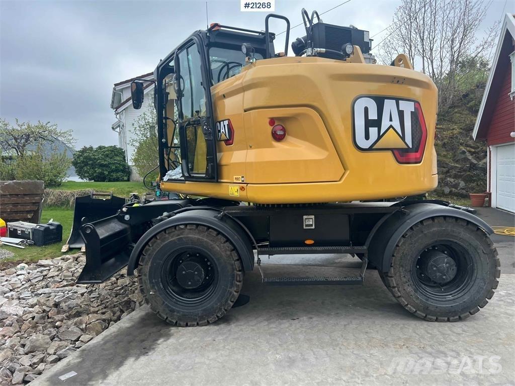 CAT M315 Gumikerekes kotrók