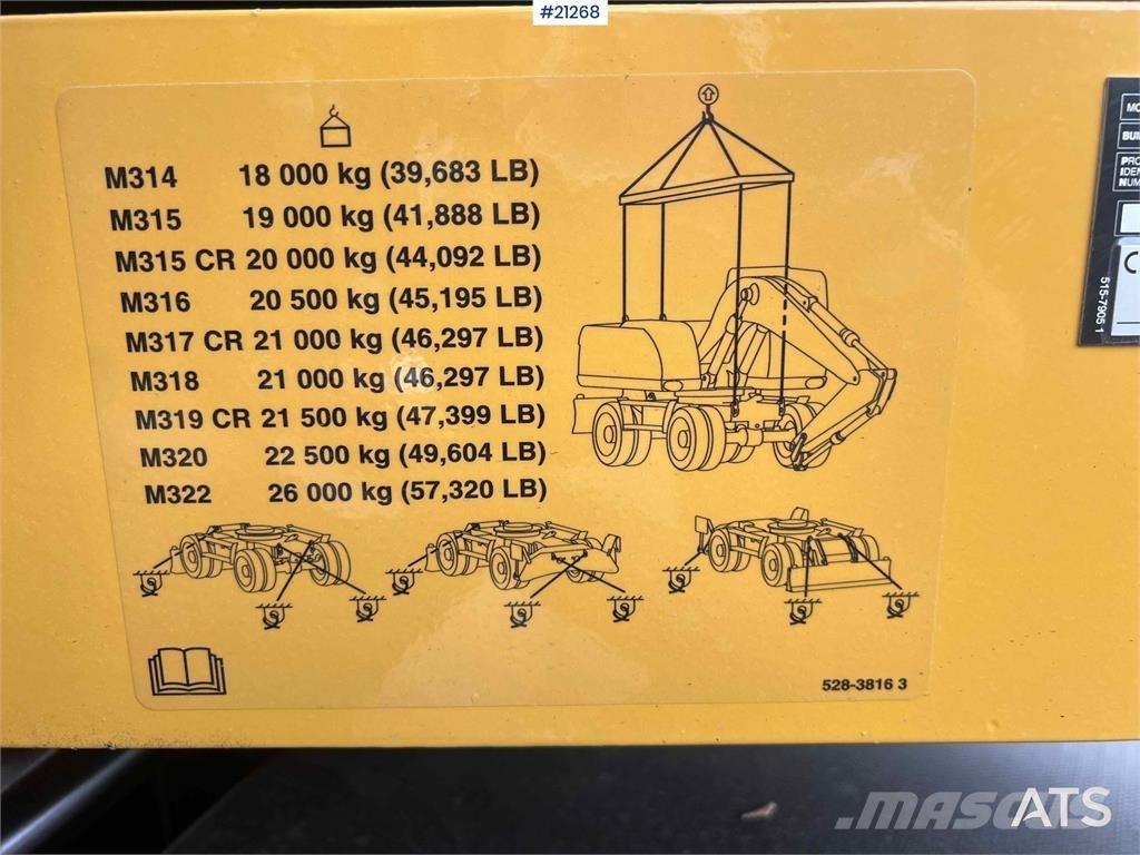 CAT M315 Gumikerekes kotrók