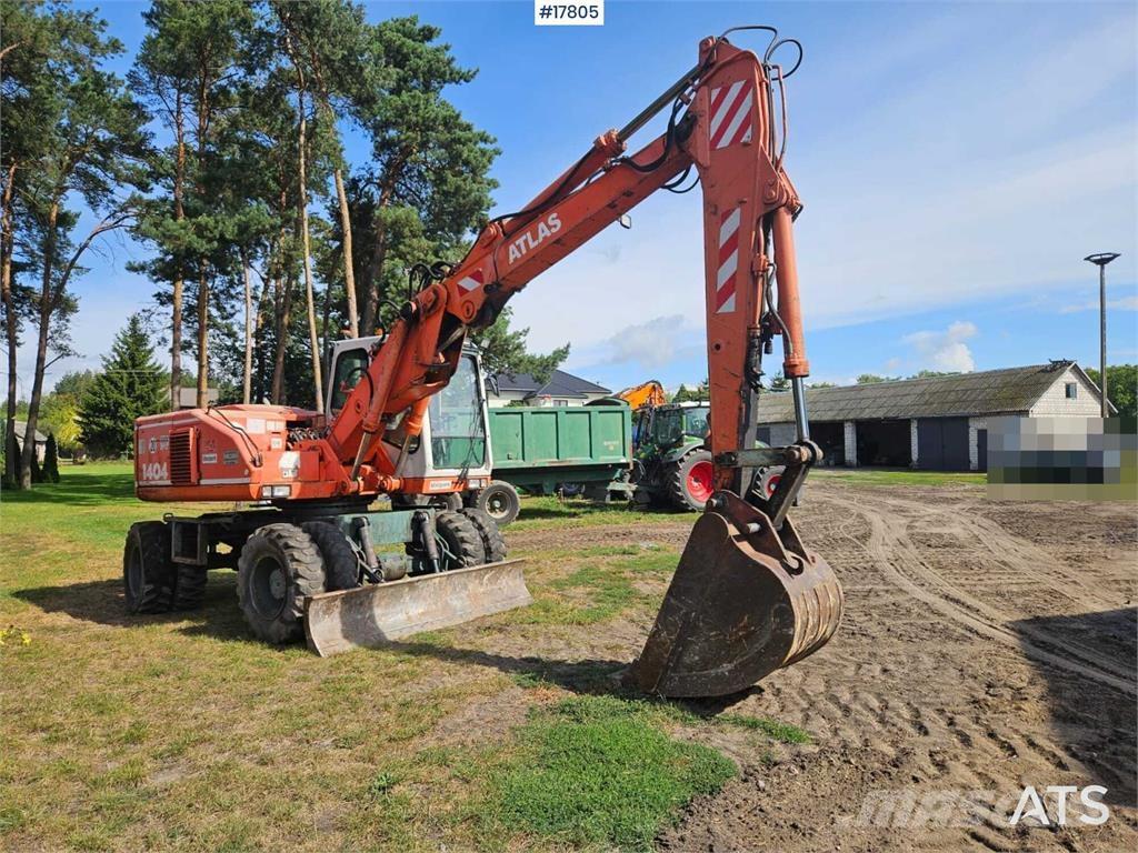 Atlas 1404 Gumikerekes kotrók