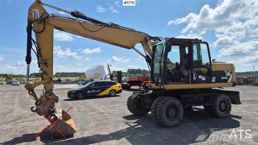 CAT M316D Gumikerekes kotrók