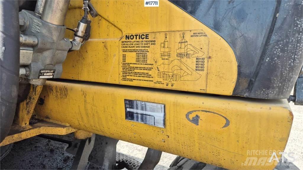 CAT M316D Gumikerekes kotrók