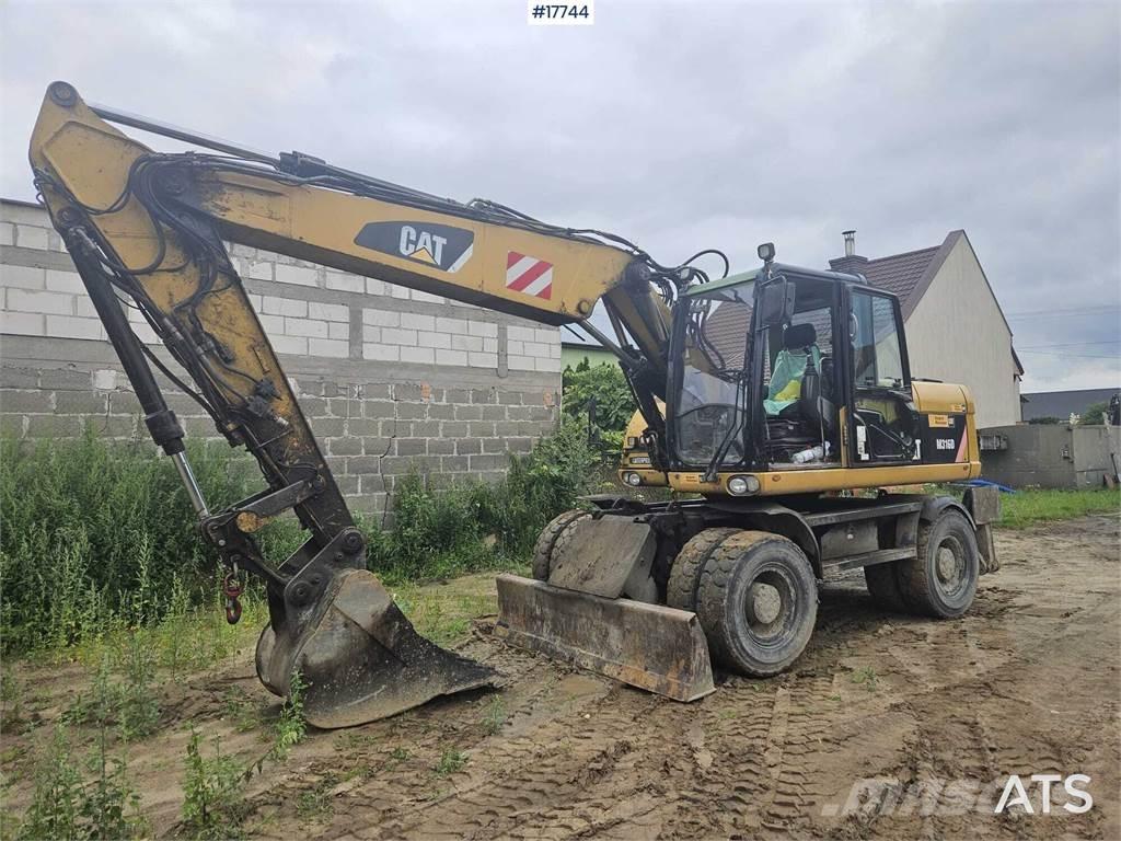 CAT M316D Gumikerekes kotrók