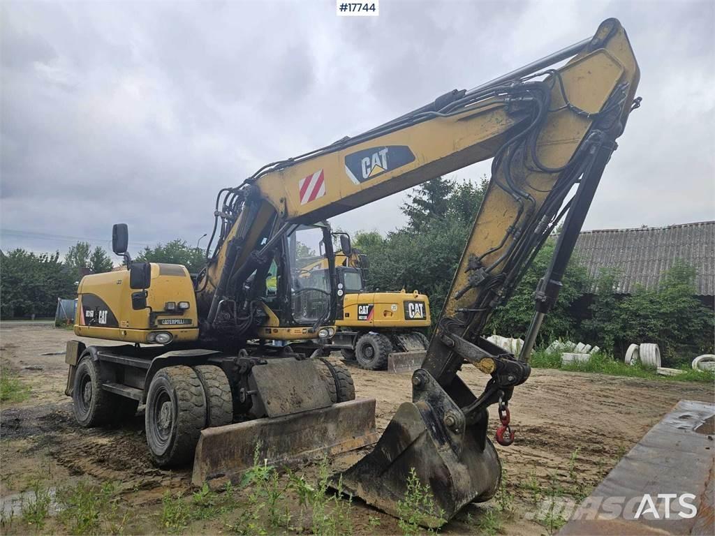 CAT M316D Gumikerekes kotrók