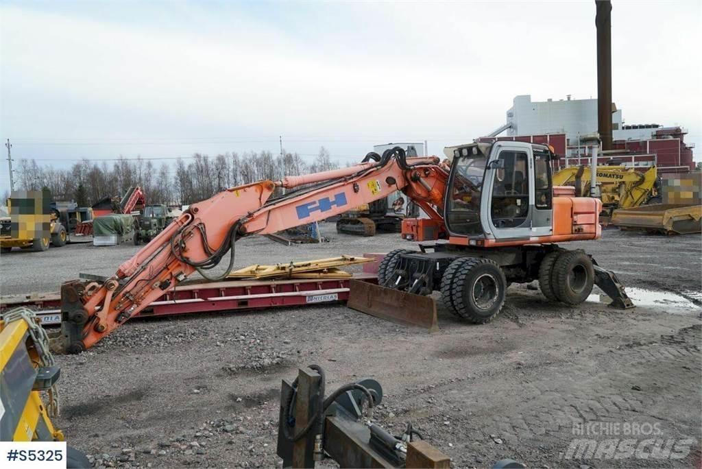 Hitachi EX165W Gumikerekes kotrók