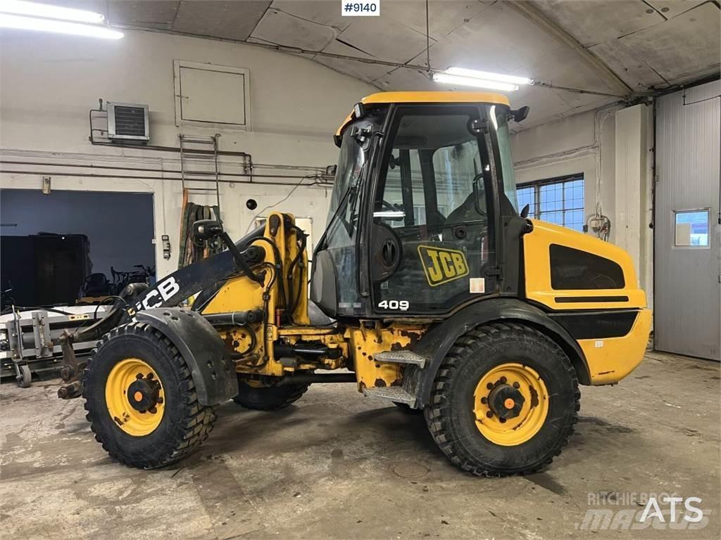 JCB 409 T4 gumikerekes dózer