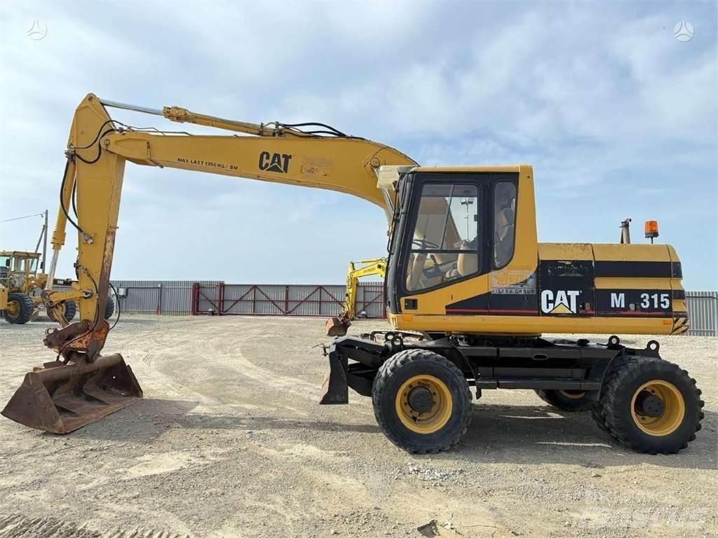CAT M 315 Gumikerekes kotrók