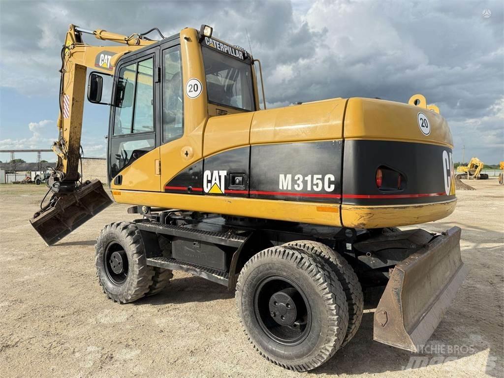 CAT M315C Gumikerekes kotrók