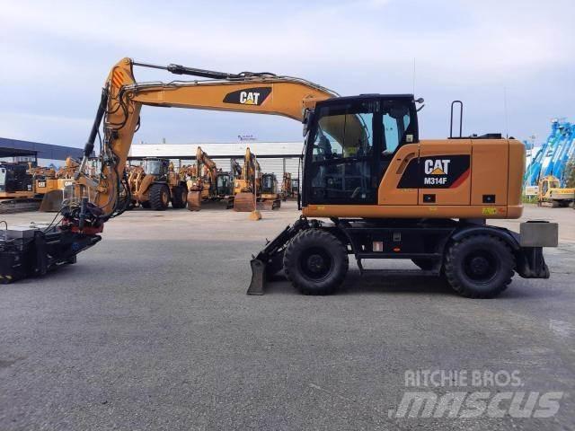 CAT M314F Gumikerekes kotrók