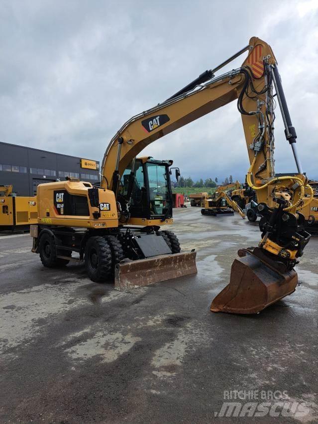 CAT M314F Gumikerekes kotrók