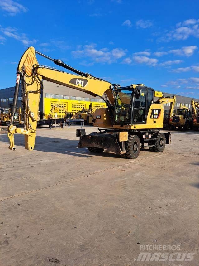 CAT M315F Gumikerekes kotrók