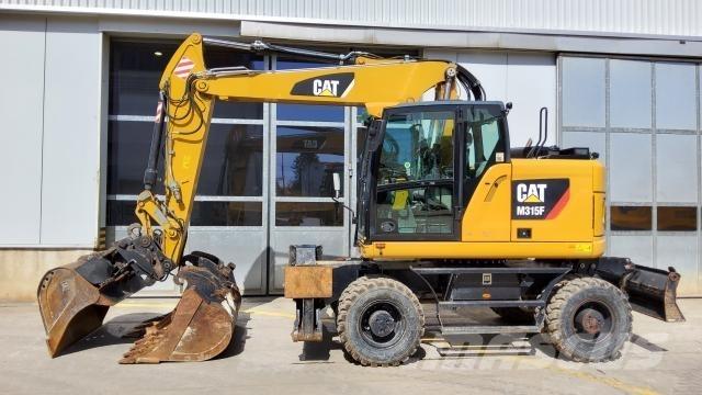 CAT M315F Gumikerekes kotrók