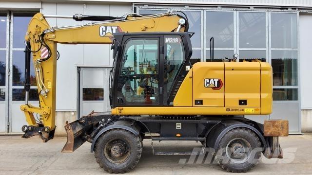CAT M318-07E Gumikerekes kotrók