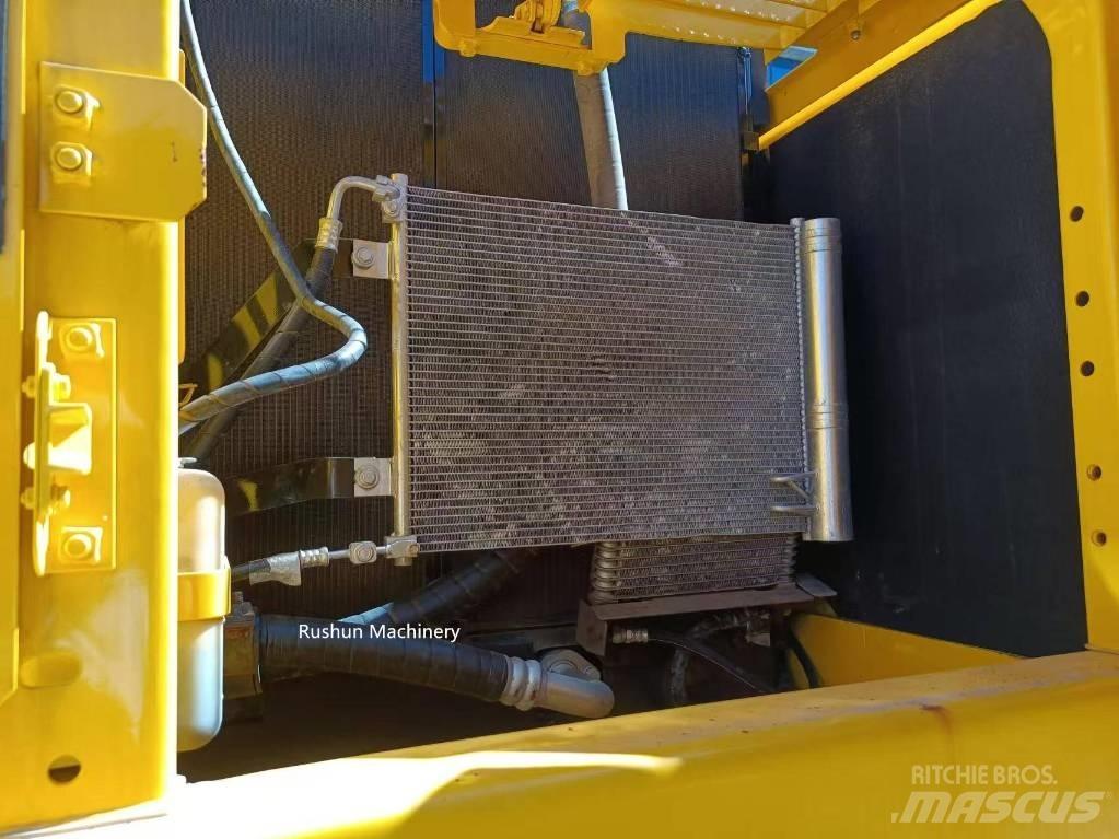 Komatsu PC 200 Közepes (midi) kotrók 7 t - 12 t