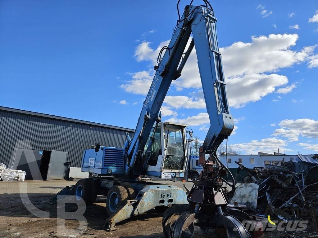 Fuchs MHL 320 Gumikerekes kotrók