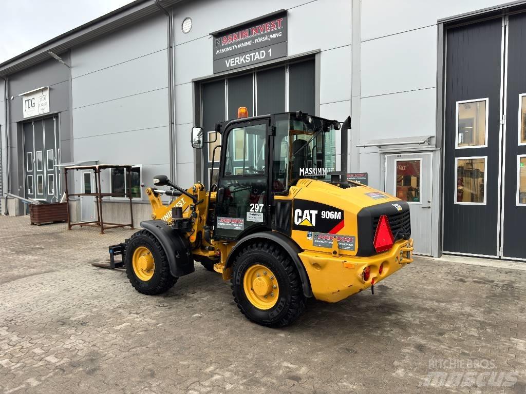 CAT 906M 35 km/h Gumikerekes homlokrakodók