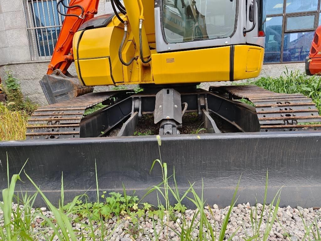 Komatsu PC 78 US Közepes (midi) kotrók 7 t - 12 t