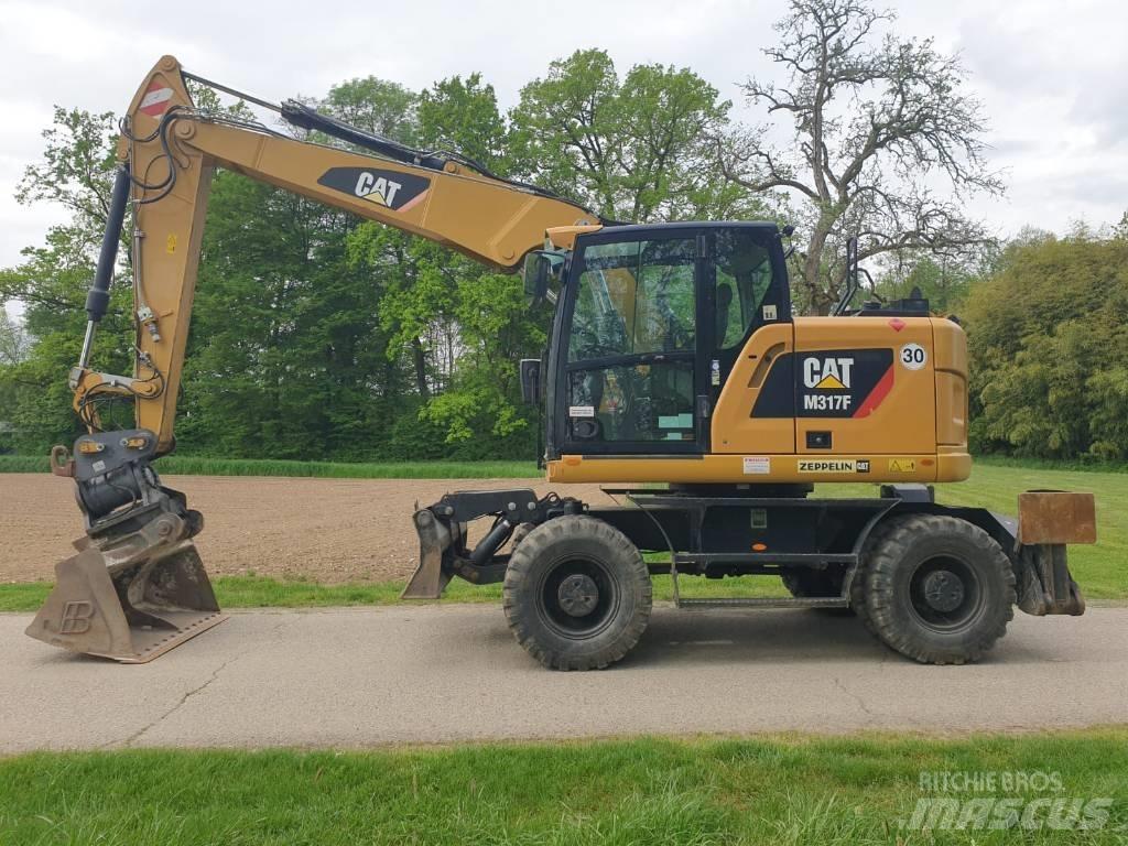 CAT M 317 F Gumikerekes kotrók