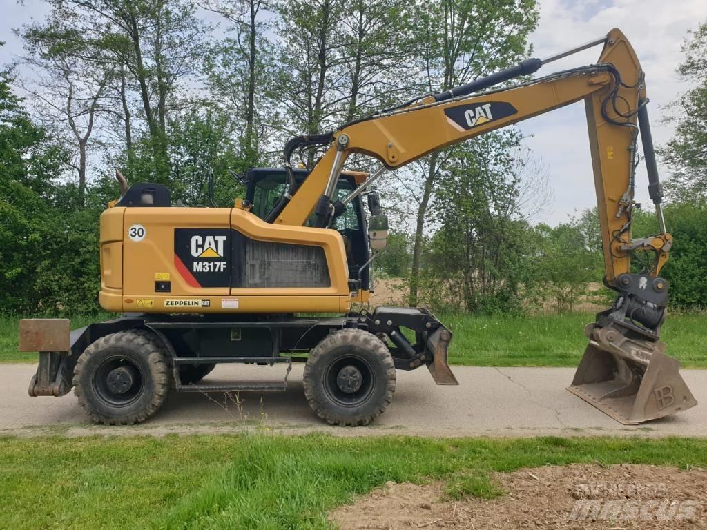 CAT M 317 F Gumikerekes kotrók