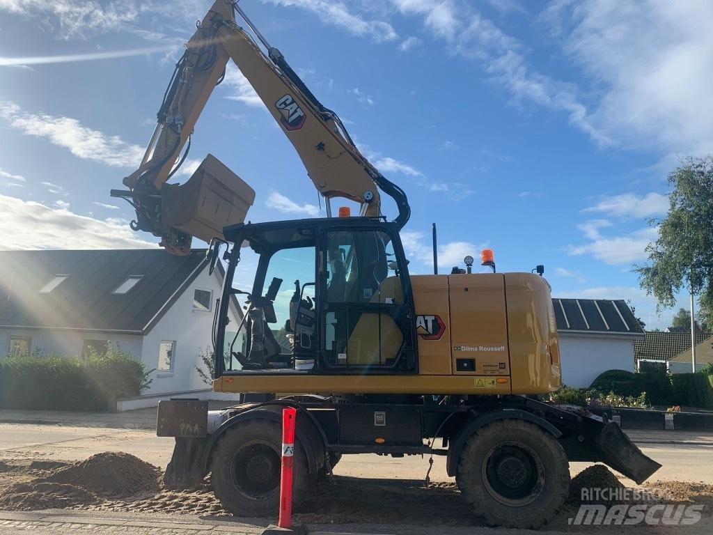 CAT M314 Gumikerekes kotrók
