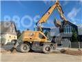 CAT M314 Gumikerekes kotrók
