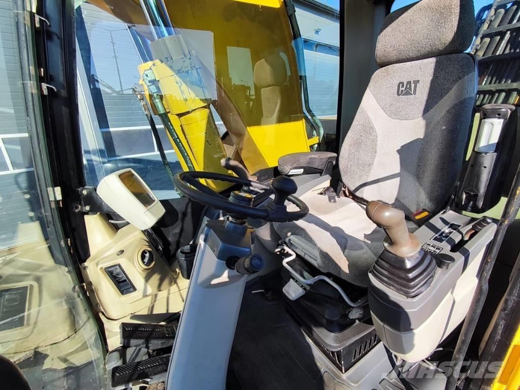 CAT M 318 C Gumikerekes kotrók