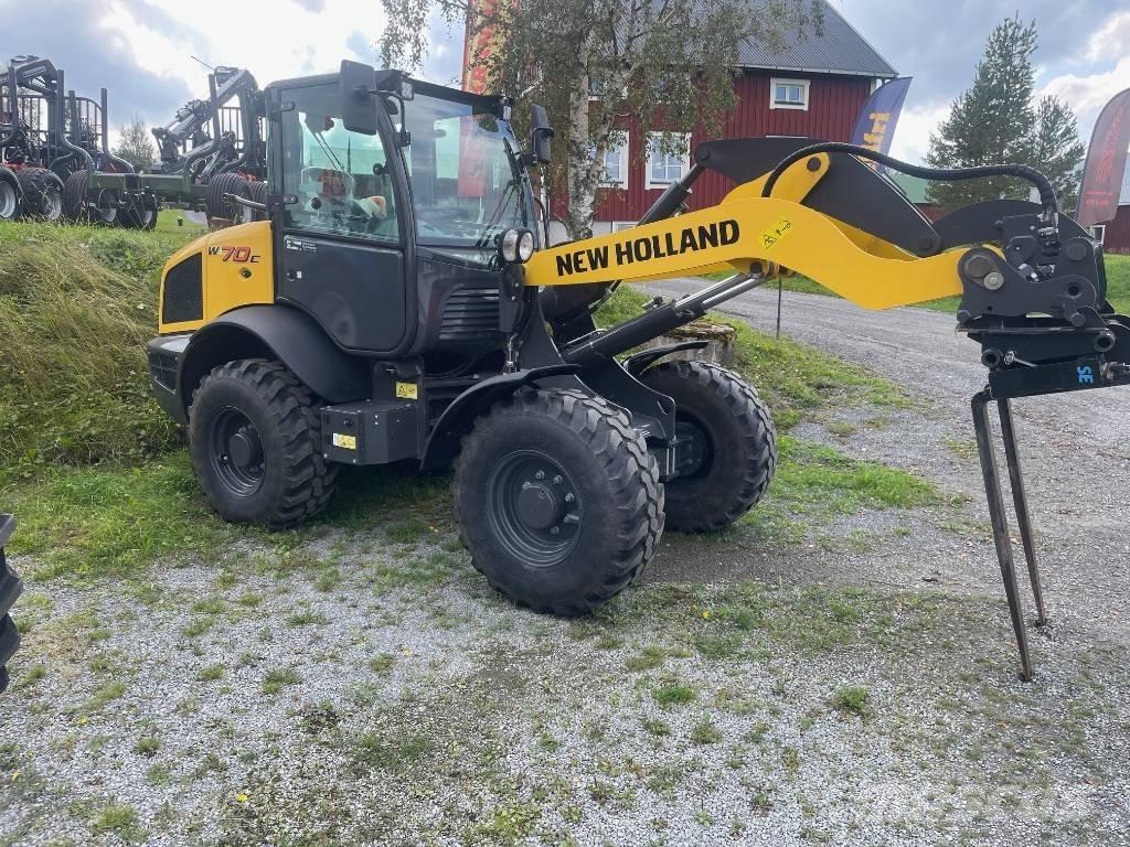 New Holland W70C Gumikerekes homlokrakodók