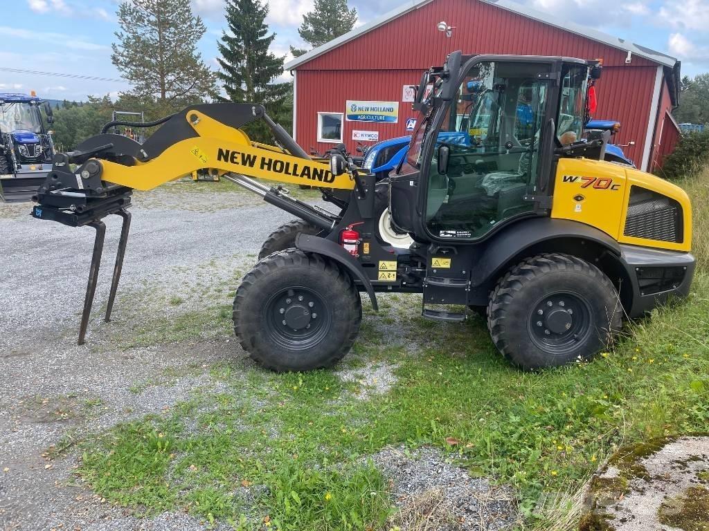 New Holland W70C Gumikerekes homlokrakodók