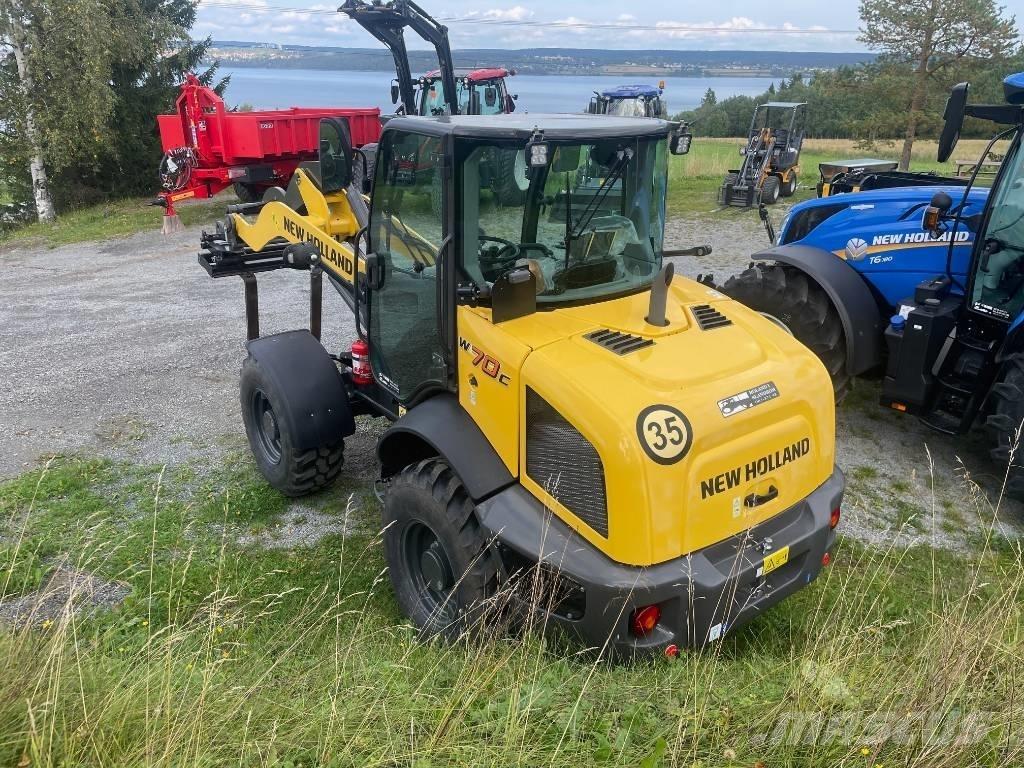 New Holland W70C Gumikerekes homlokrakodók