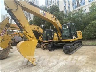 CAT 2021 CAT 323Gx Gumikerekes kotrók