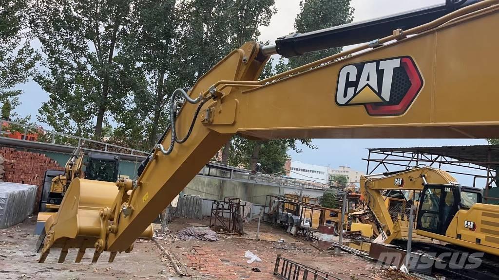 CAT 2021 CAT 323Gx Gumikerekes kotrók