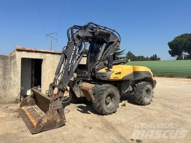 Mecalac 12 MTX Gumikerekes kotrók