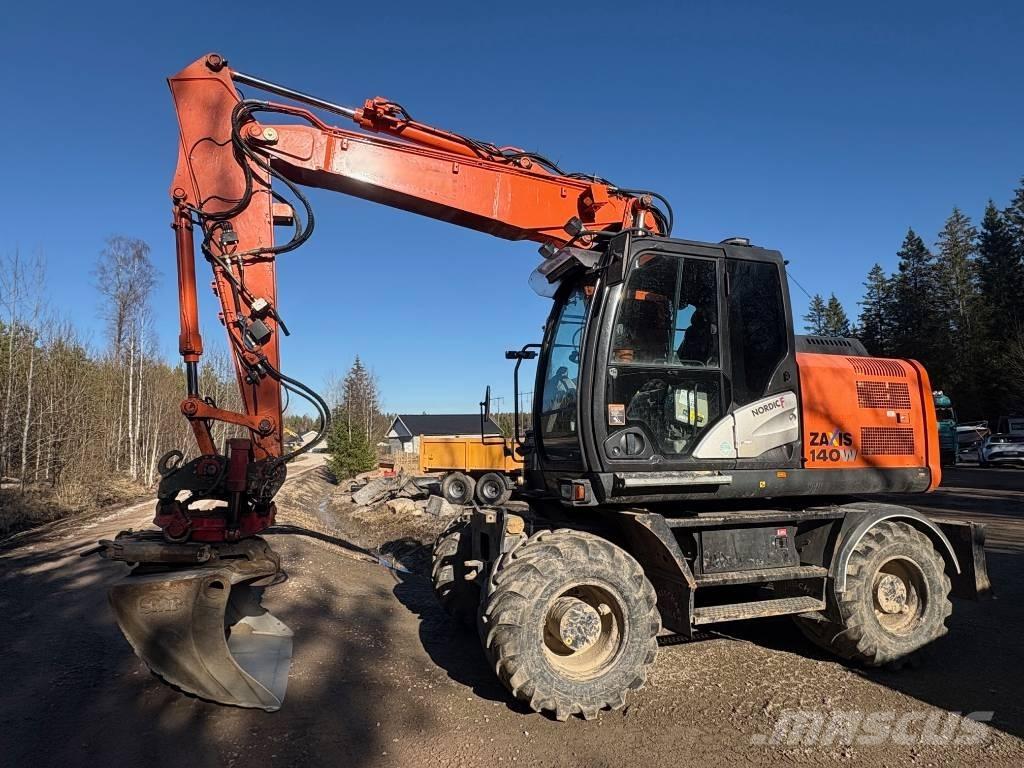Hitachi ZX 140 W-5B Gumikerekes kotrók
