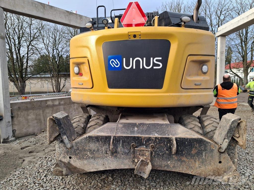 CAT M315F Gumikerekes kotrók