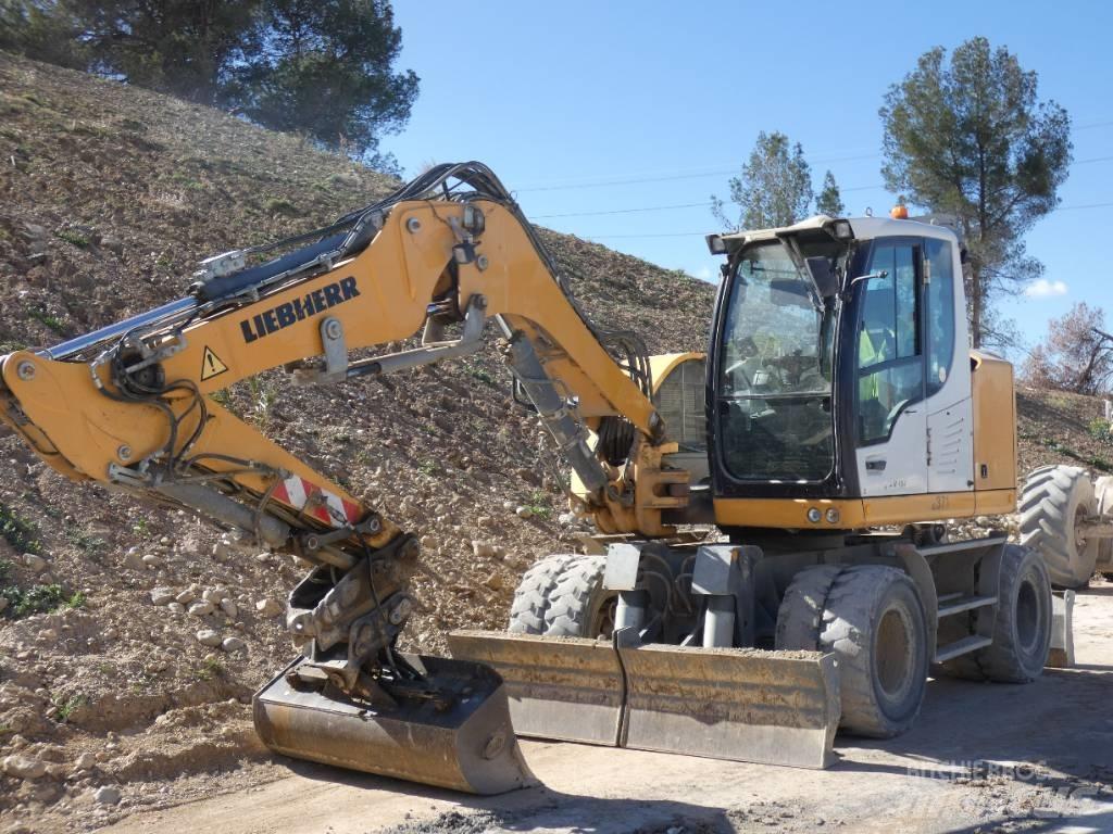 Liebherr A 912 Gumikerekes kotrók