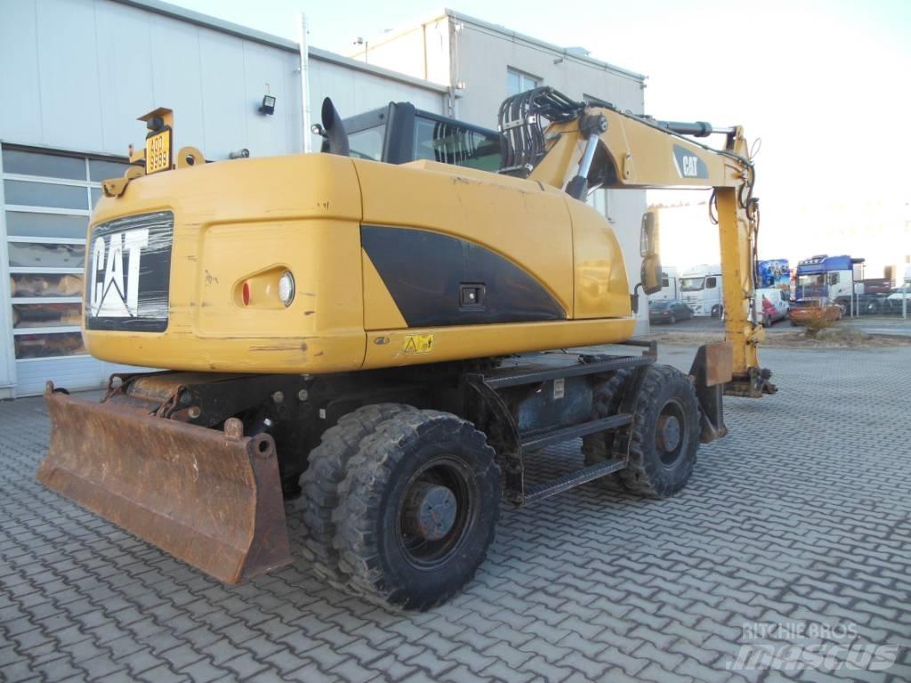 CAT M 316 D Gumikerekes kotrók