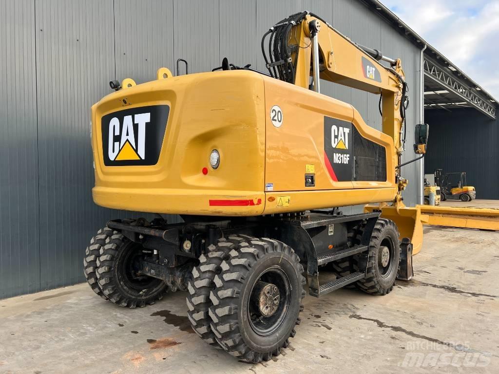CAT M316F Gumikerekes kotrók