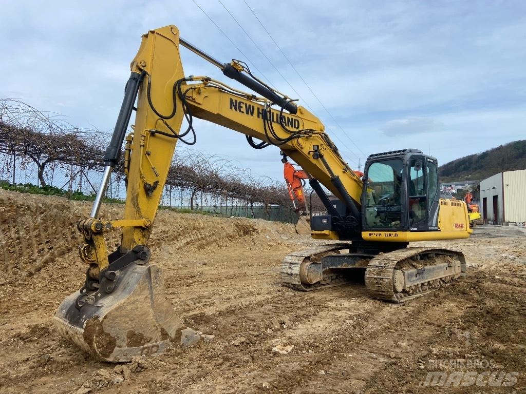 New Holland E245 Lánctalpas kotrók