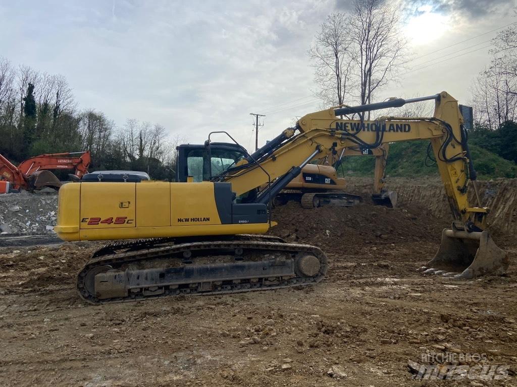 New Holland E245 Lánctalpas kotrók