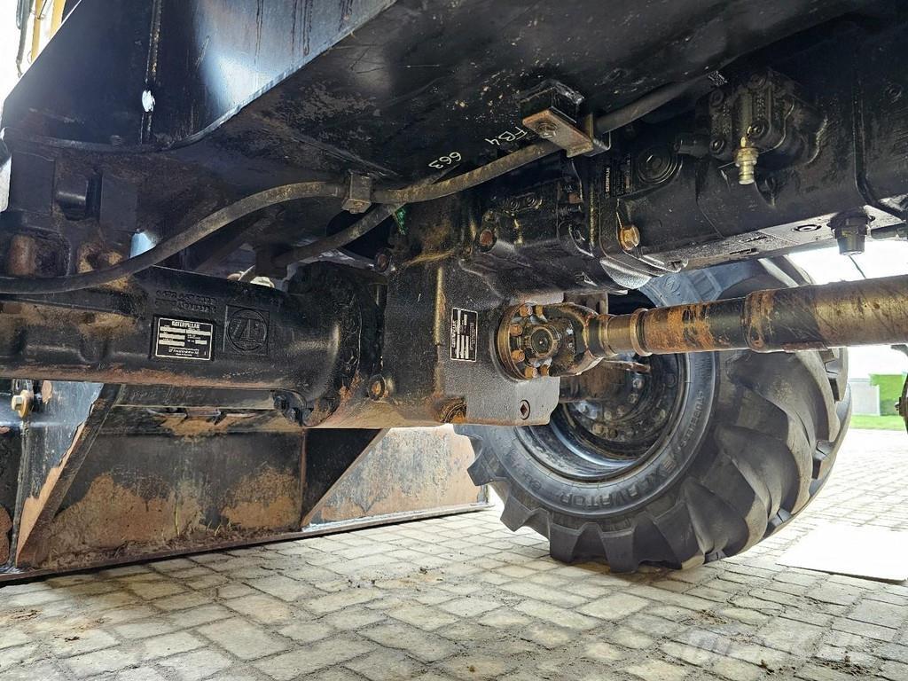 CAT M314F Gumikerekes kotrók