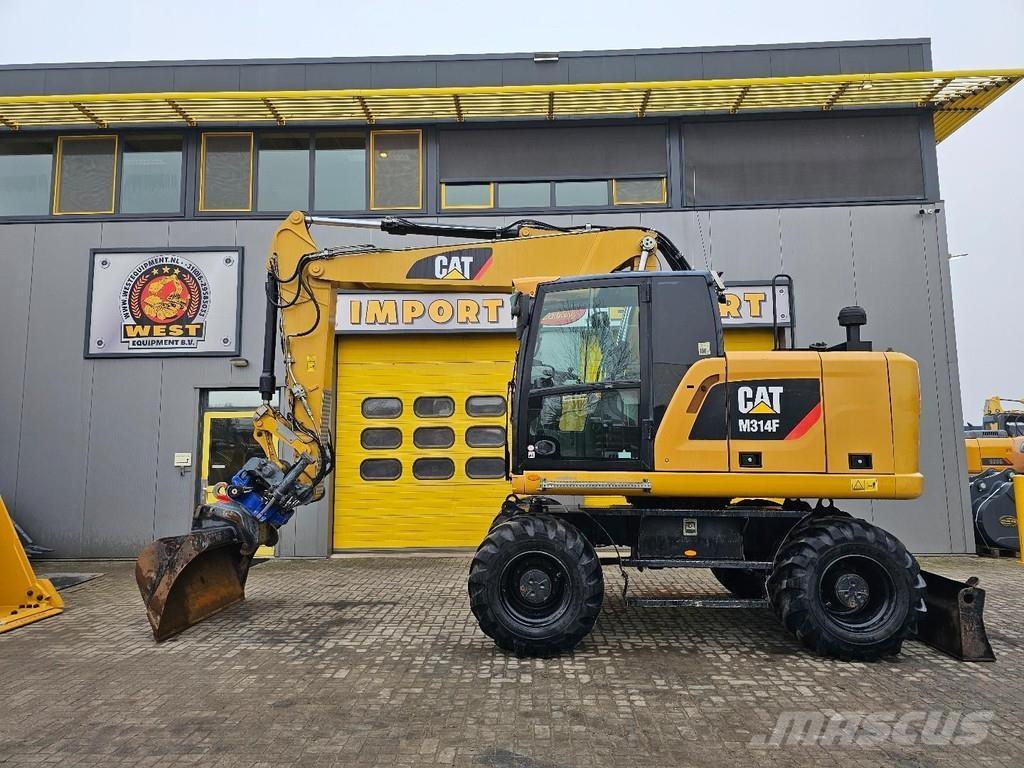 CAT M314F Gumikerekes kotrók